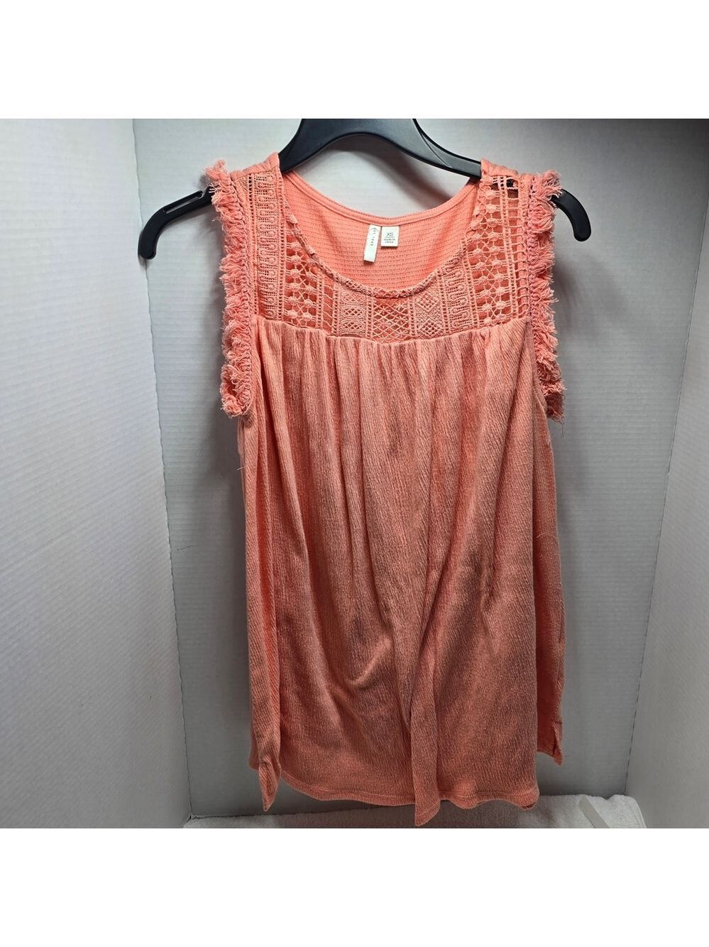 Elegant Sleeveless Coral Blouse with Crochet Accents